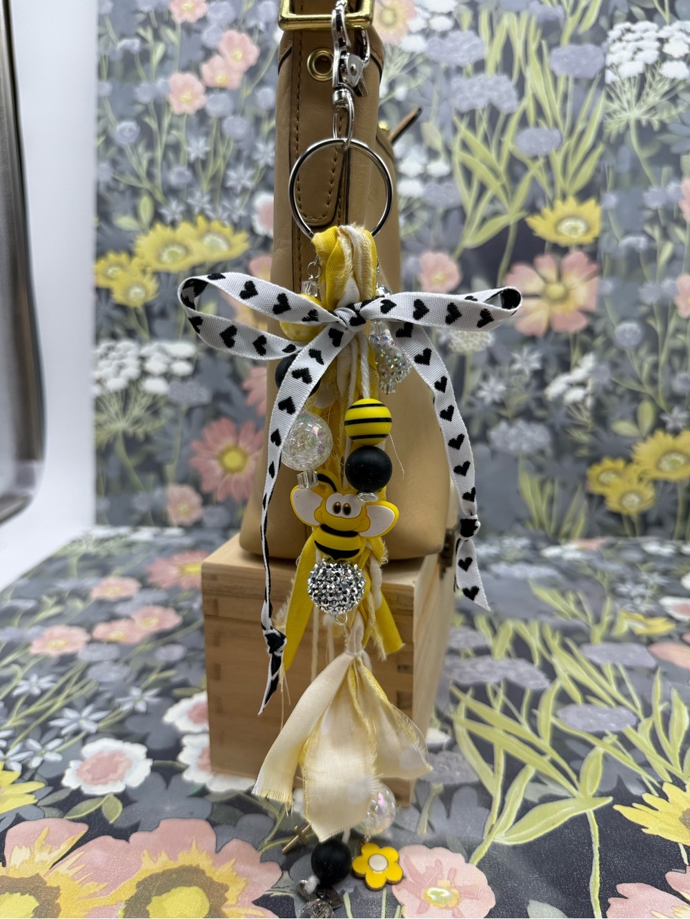 Adorned Crown Jewelry purse bag charm keychain bee fabric tassel
